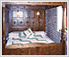 6ft 6in four poster bed with carved panels 6ft 6in four poster bed with carved panels